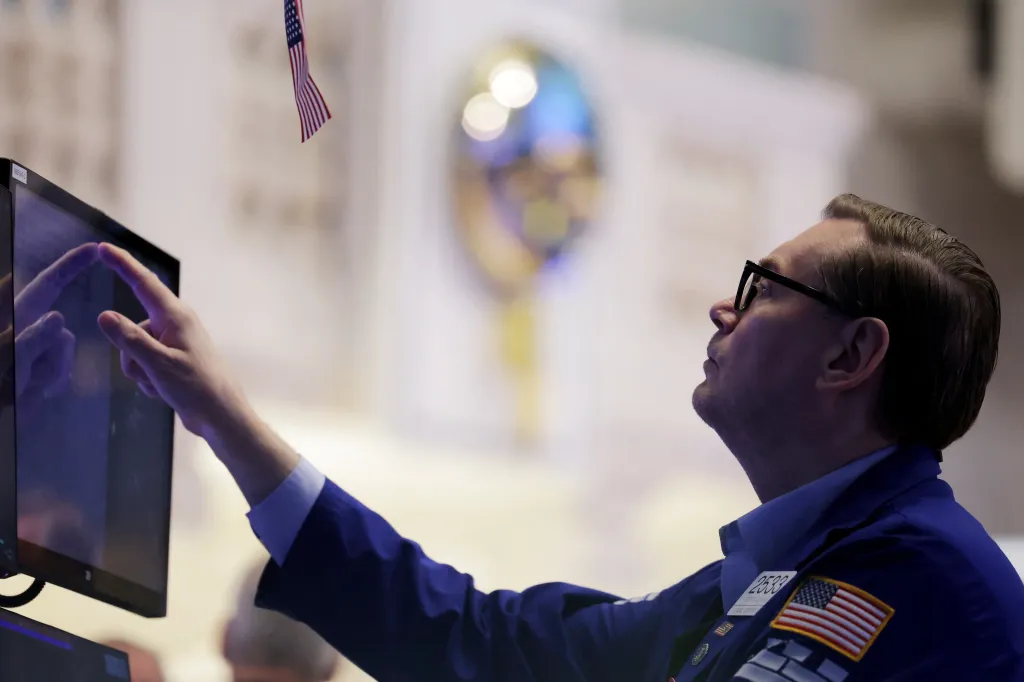 A trader works on the trading floor at the New York Stock Exchange (NYSE) in New York City, U.S., April 5, 2024. REUTERS/Andrew Kelly