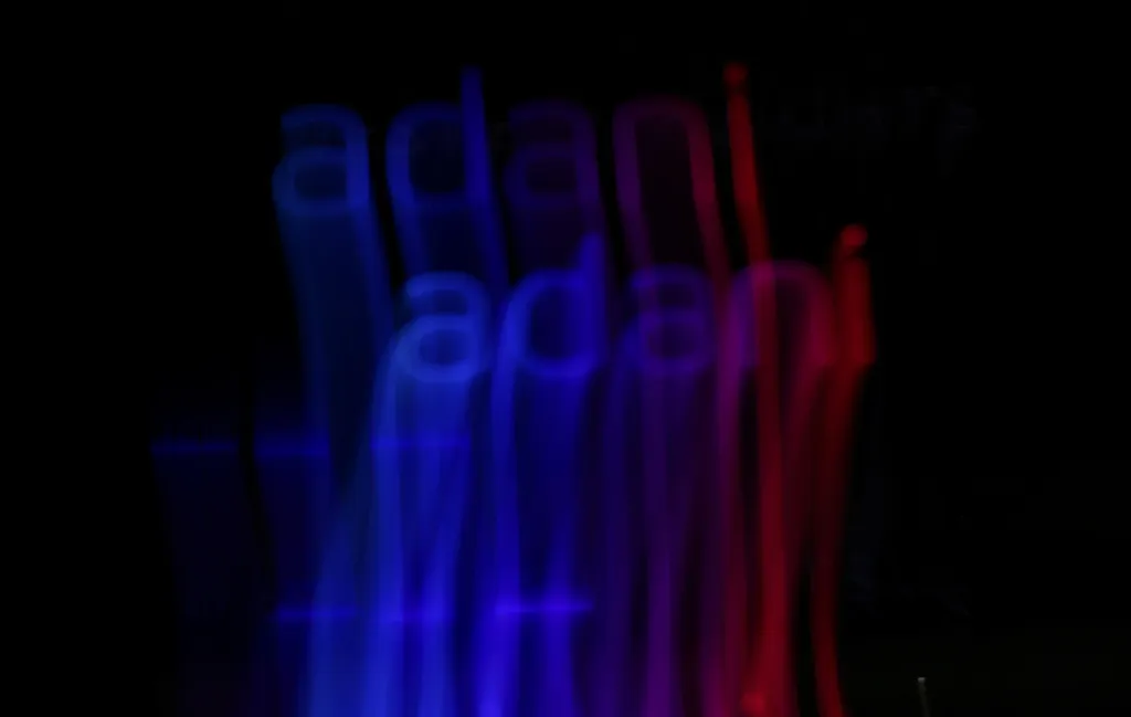 FILE PHOTO: The logo of the Adani Group is seen on a building, in Mumbai, India, January 27, 2023. Picture taken with long exposure. REUTERS/Francis Mascarenhas/File Photo