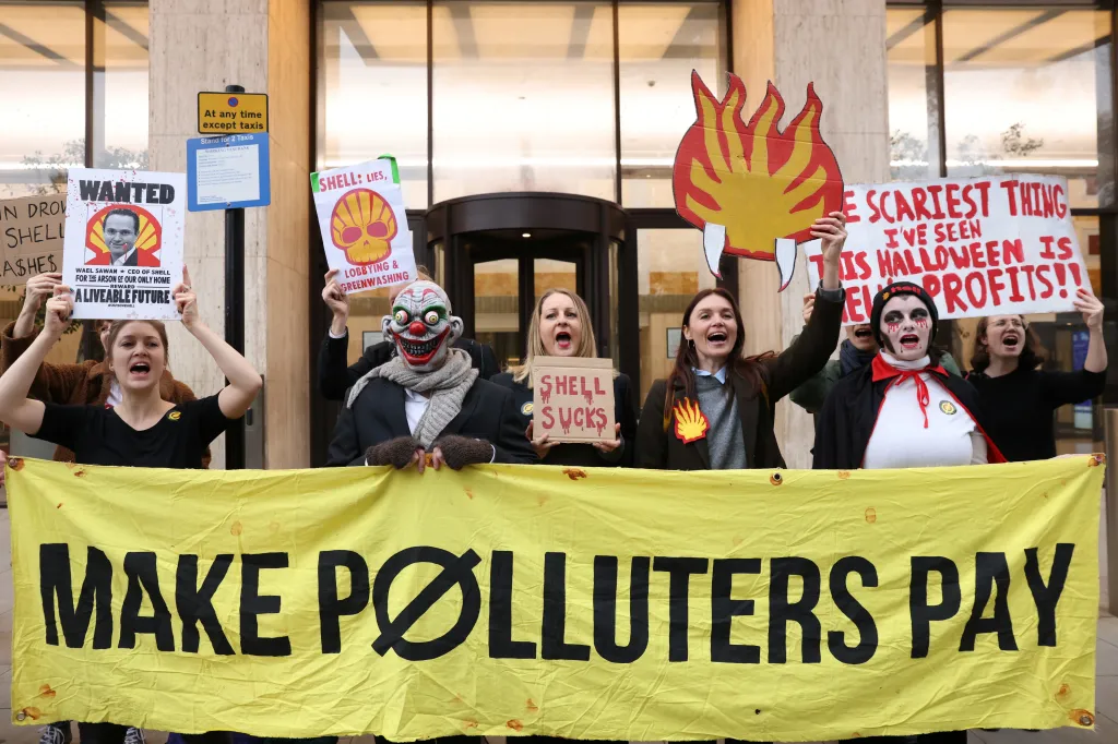 Climate activists in Halloween costumes protest outside Shell's global headquarters in London, Britain, October 31, 2024. REUTERS/Hollie Adams