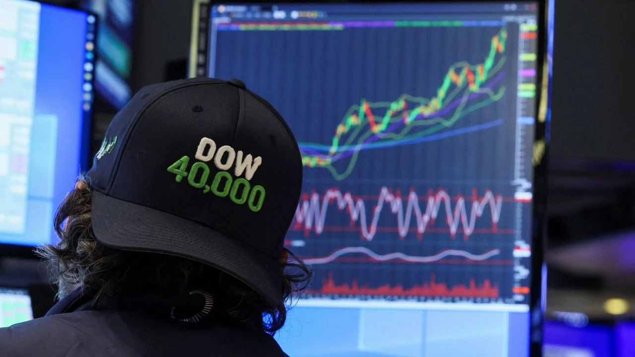 Индекс Dow Jones в пятницу впервые закончил торги на отметке выше 40 тыс. пунктов / Фото: Reuters/Brendan McDermid