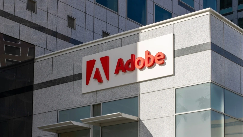 Adobe сообщила, что внедрение ИИ начинает приносить результаты / Фото: Tada Images / Shutterstock.com