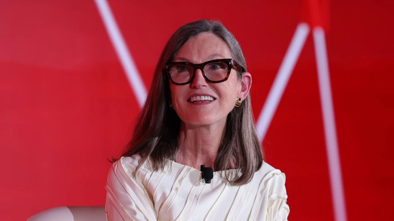 Cathie Woods fund is buying up crypto stocks on the downturn. Should we follow her example?