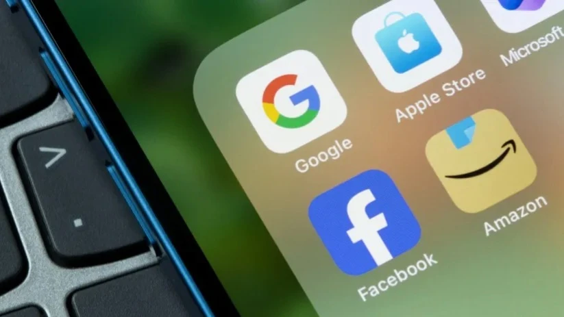 Five of the Magnificent Seven tech giants will report earnings in the middle of this week / Photo: Tada Images / Shutterstock.com