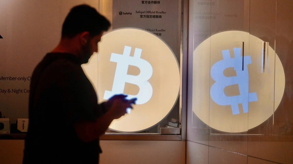 Преодоление биткоином ценового барьера спровоцировало принудительное закрытие коротких позиций, или шорт-сквиз / Фото: Lamma Leung/Shutterstock.com