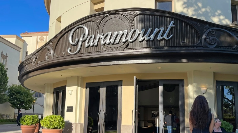 An agreement with a coalition of attorneys general from 12 states clears the way for Paramount to complete its acquisition of Warner Bros. Discovery. Photo: Alex Millauer/Shutterstock